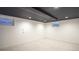 This finished basement features recessed lights and egress windows at 13833 W 68Th Ave, Arvada, CO 80004