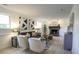Cozy basement with a fireplace, stylish decor, and ample seating, ideal for relaxation and entertaining at 13833 W 68Th Ave, Arvada, CO 80004