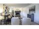 Inviting living room with decorative fireplace and modern decor; perfect gathering space at 13833 W 68Th Ave, Arvada, CO 80004