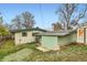 Exterior backyard view features partial home, and lush greenery plus an exterior shed for extra storage space at 7948 Stuart St, Westminster, CO 80030