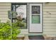 Close-up of front door with sidelight, mail box, and clear numbering at 7948 Stuart St, Westminster, CO 80030