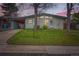 Charming single-story home with well-maintained front lawn, carport, and inviting entryway offers curb appeal at 7948 Stuart St, Westminster, CO 80030