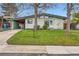Charming single-story home with a well-manicured lawn and a covered carport at 7948 Stuart St, Westminster, CO 80030