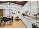 Bright kitchen featuring ample counter space, plentiful cabinets, and modern appliances at 7948 Stuart St, Westminster, CO 80030
