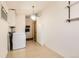 Spacious laundry room with modern appliances, offering convenience and ample storage at 7948 Stuart St, Westminster, CO 80030