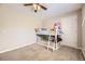 Cozy bedroom with bunk beds and plush carpet is great for or guests at 381 S Ames St # F208, Lakewood, CO 80226