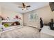 Shared bedroom features a bunk bed, soft carpeting, and a well-lit window at 381 S Ames St # F208, Lakewood, CO 80226