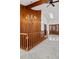 Entryway featuring wood paneling, a chandelier, and a skylight at 6980 Oak St, Arvada, CO 80004