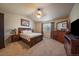 Cozy bedroom with neutral tones, lots of natural light, and warm accents at 1758 Parkdale N Cir, Erie, CO 80516