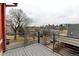 Balcony with city views and tree-lined street at 3233 Osage St # 2A, Denver, CO 80211