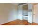 Bedroom with hardwood floors and built-in desk at 3233 Osage St # 2A, Denver, CO 80211