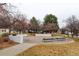 Small community park with paved sitting area and benches at 3233 Osage St # 2A, Denver, CO 80211