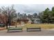 Park view with benches and distant city skyline at 3233 Osage St # 2A, Denver, CO 80211