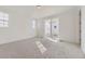 Bright bedroom with a window and sliding glass door leading to a balcony at 968 Congress Pl, Elizabeth, CO 80107