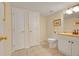 Clean and functional bathroom with neutral tiles and essential fixtures at 20530 Parker Vista Cir, Parker, CO 80138