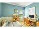 Office with built-in desk, chair, bookcase, and a large window at 20530 Parker Vista Cir, Parker, CO 80138