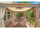 Outdoor patio with a gazebo, table, and chairs at 20530 Parker Vista Cir, Parker, CO 80138