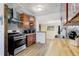 Well-equipped kitchen with stainless steel appliances and stylish backsplash at 6743 Wild Rose Ln, Evergreen, CO 80439
