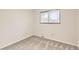 Cozy bedroom with neutral carpet and light colored walls, perfect for relaxation at 798 Alkire St, Lakewood, CO 80401