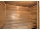 A pristine indoor sauna features wood construction and a wooden bench at 798 Alkire St, Lakewood, CO 80401