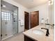 Modern bathroom with a glass shower, double vanity, and stylish fixtures at 41 Stillson Placer Ter, Breckenridge, CO 80424