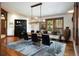 Chic dining space featuring a modern chandelier and natural light from multiple windows at 41 Stillson Placer Ter, Breckenridge, CO 80424