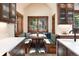 Bright breakfast nook features bench seating and a view of the backyard at 41 Stillson Placer Ter, Breckenridge, CO 80424