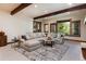 Bright and airy living room with comfortable sectional sofa and views of the surrounding landscape at 41 Stillson Placer Ter, Breckenridge, CO 80424