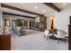 Inviting living room with beamed ceilings, stone fireplace, and comfortable seating at 41 Stillson Placer Ter, Breckenridge, CO 80424
