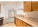 Bright kitchen featuring stainless appliances with a large counter space at 14211 E 1St Dr # 308, Aurora, CO 80011