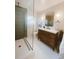 Modern bathroom with sleek shower, stylish vanity, and elegant fixtures, perfect for relaxation at 900 Locust St, Denver, CO 80220