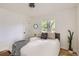 Bedroom featuring a queen sized bed and modern decor at 900 Locust St, Denver, CO 80220