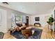 Stylish living room with hardwood floors, modern furniture, and neutral decor at 900 Locust St, Denver, CO 80220