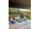 Cozy covered patio with comfortable seating and ambient lighting, ideal for outdoor entertaining at 900 Locust St, Denver, CO 80220