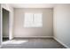 Unfurnished bedroom with new carpet, natural light and a neutral color palette, ready for customization at 2741 Sunset Way, Erie, CO 80516