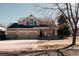 Inviting two-story home featuring a three-car garage and charming front porch at 2741 Sunset Way, Erie, CO 80516