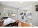 Open-concept kitchen with modern white cabinets, and bright lighting at 2060 S Lowell Blvd, Denver, CO 80219