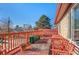 Spacious outdoor deck with a seating area, perfect for relaxation and entertaining at 4215 W Byron Pl, Denver, CO 80212