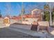 Charming home with a spacious deck, well-maintained landscaping, and inviting curb appeal at 4215 W Byron Pl, Denver, CO 80212