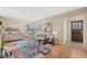 Bright living room with hardwood floors and neutral decor at 4215 W Byron Pl, Denver, CO 80212