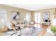 Inviting living room featuring stylish furnishings, elegant decor, and an abundance of natural light at 4215 W Byron Pl, Denver, CO 80212