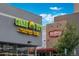 Neighborhood restaurants, Cheba Hut and Alamo Drafthouse Cinema, with well-lit signage on a sunny day at 4215 W Byron Pl, Denver, CO 80212