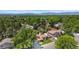 Aerial view of a residential neighborhood with mature trees and well-maintained homes at 7276 W 83Rd Way, Arvada, CO 80003