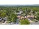 Aerial view of a residential neighborhood with mature trees and well-maintained homes at 7276 W 83Rd Way, Arvada, CO 80003