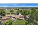 Beautiful suburban home with a well-manicured lawn, mature trees, and a neighborhood park nearby at 7276 W 83Rd Way, Arvada, CO 80003
