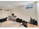 Finished basement area with carpet, one window, and space for various uses, providing extra living space at 7276 W 83Rd Way, Arvada, CO 80003