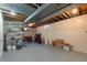 Unfinished basement featuring exposed ducts, concrete walls, and open space for storage or customization at 7276 W 83Rd Way, Arvada, CO 80003
