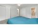 Bedroom featuring two closets, one bedroom ensuite, and carpeting, blending convenience and comfort at 7276 W 83Rd Way, Arvada, CO 80003