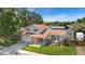 Charming two-story home with brick accents, a well-manicured lawn, and a two-car garage at 7276 W 83Rd Way, Arvada, CO 80003