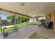 Covered patio with concrete flooring and outdoor furniture, offering a relaxing outdoor space at 7276 W 83Rd Way, Arvada, CO 80003